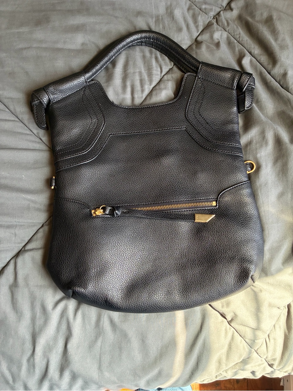 Folly and Corinna Black Leather Women’s Tote Handbag with Gold Hardware